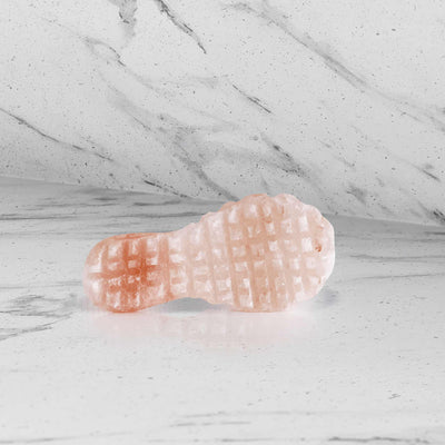 100% PURE HIMALAYAN SALT BODY PADDLE FROM PIETRO SIMONE; pictured on tile/bathroom surface